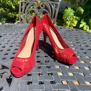 Guess lace with patent leather heels.